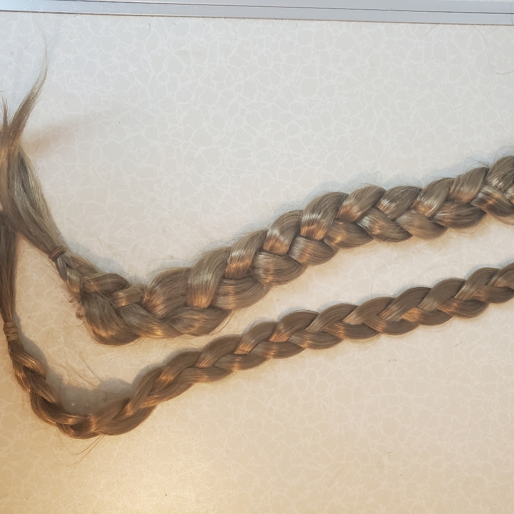 Synthetic braids, assorted blonds.